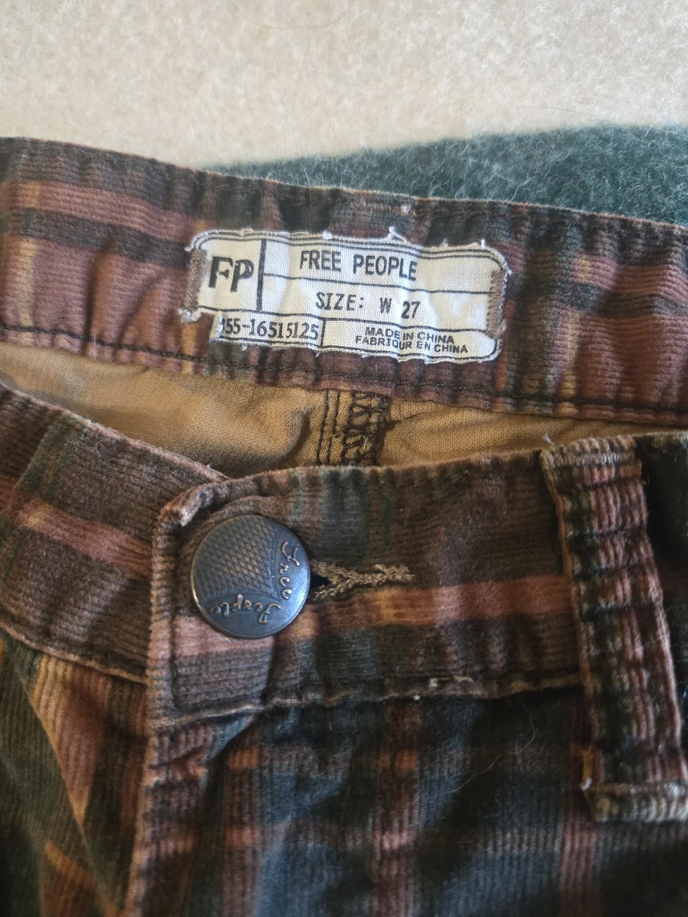 Free People Plaid Skinny Jeans in Rust, Brown, and Black